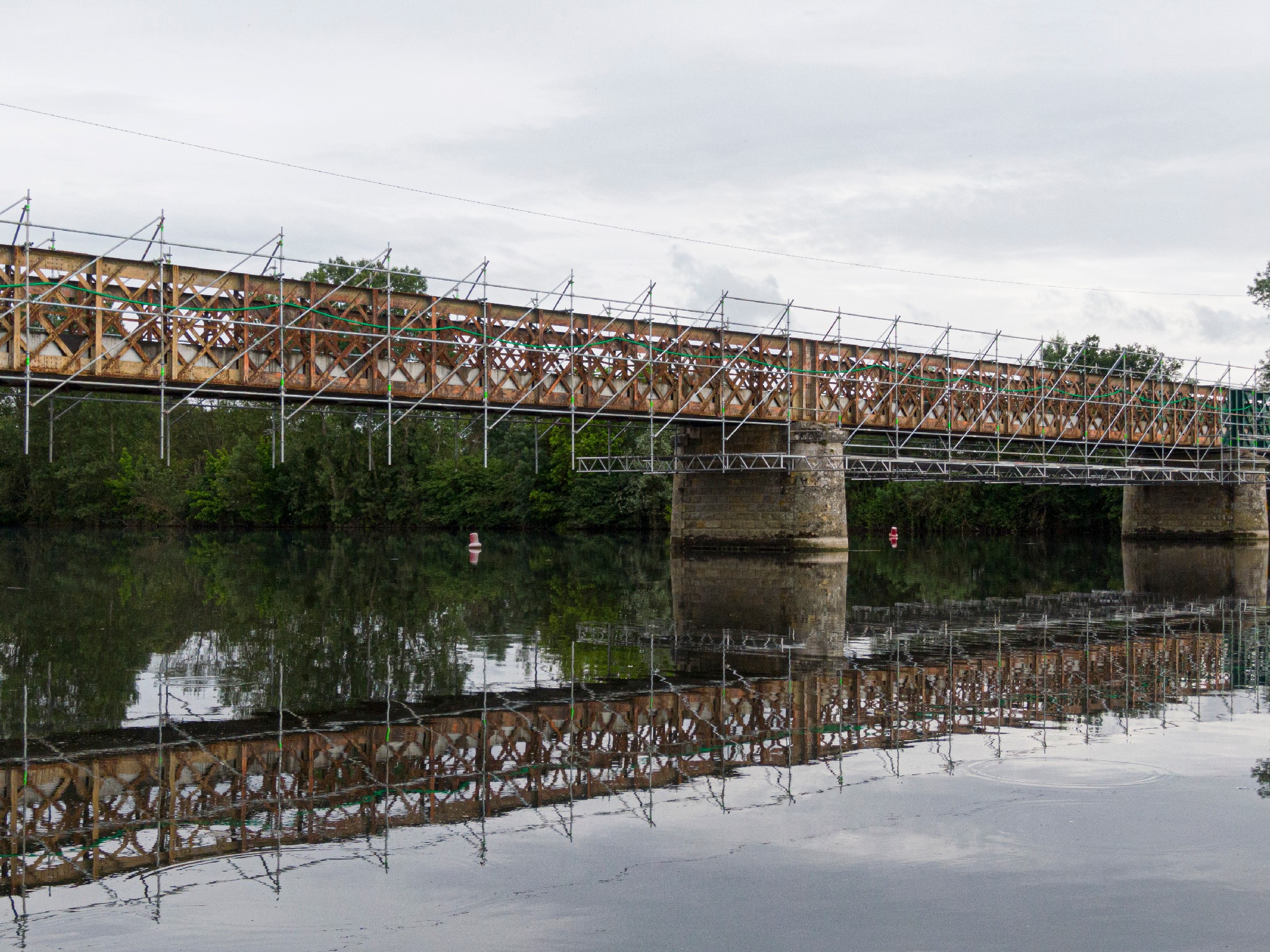 Scaffolding Used For Maintenance Or Restoration Work On A Small Bridge Over A Large River The Cher